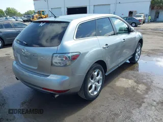 2010 Mazda CX-7 Touring with VIN JM3ER2W31A0348858, listed as a IAAI auction lot 42084790 with 136,261 mi miles. Bid and sale history available at carsss.com. Image 4.