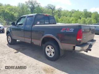 2002 Ford F-150 XL with VIN 1FTRX18L82NA18808, listed as a IAAI auction lot 42259883 with 154,519 mi miles and . Bid and sale history available at DreamBid. Image 3.
