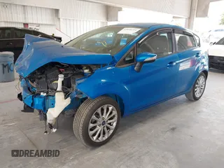 2014 Ford Fiesta SE with VIN 3FADP4EJ7EM204438, listed as a IAAI auction lot 42098291 with 184,930 mi miles and . Bid and sale history available at DreamBid. Image 18.