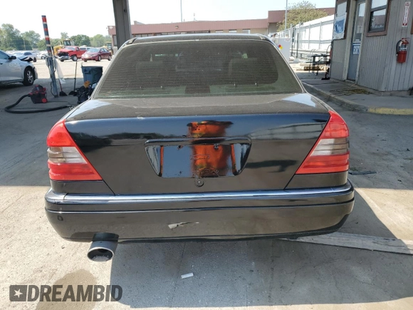 1996 Mercedes-Benz C with VIN WDBHA28E1TF402525, listed as a Copart auction lot 69050504 with 178,492 mi miles and Salvage Title. Bid and sale history available at carsss.com. Image 6.
