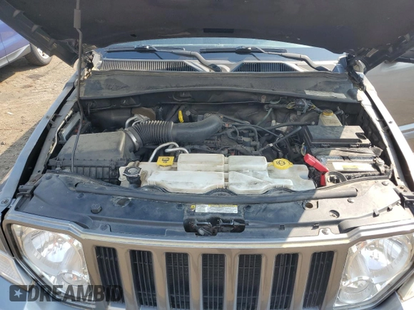 2012 Jeep Liberty Sport z VIN 1C4PJMAK1CW120233, wystawiony jako Copart lot #59922665 z przebiegiem 85 217 mil mil oraz Czysty tytuł • Clean title. Historia ofert i sprzedaży dostępna na DreamBid. Obrazek 11.