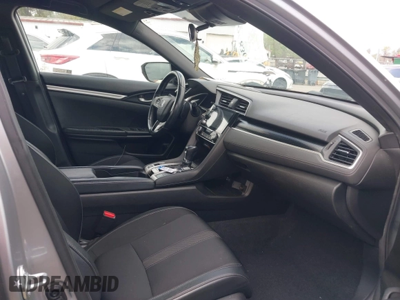 2021 Honda Civic Sport with VIN 2HGFC2F88MH530214, listed as a IAAI auction lot 41968361 with 60,869 mi miles and . Bid and sale history available at DreamBid. Image 5.