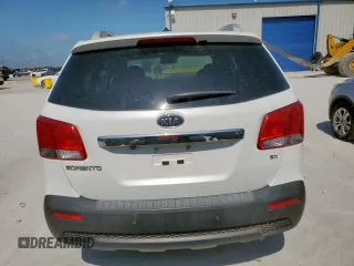 2012 Kia Sorento EX z VIN 5XYKU4A64CG271617, wystawiony jako Copart lot #64901615 z przebiegiem 127 061 mil mil oraz Czysty tytuł • Clean title. Historia ofert i sprzedaży dostępna na DreamBid. Obrazek 6.
