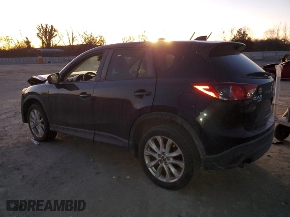 2014 Mazda CX-5 Grand Touring with VIN JM3KE4DY9E0366667, listed as a Copart auction lot 88707365 with 140,115 mi miles and Salvage Title. Bid and sale history available at carsss.com. Image 2.