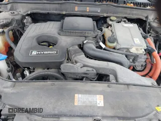 2014 Ford Fusion SE Hybrid with VIN 3FA6P0LUXER236740, listed as a IAAI auction lot 41399510 with 82,720 mi miles. Bid and sale history available at carsss.com. Image 10.