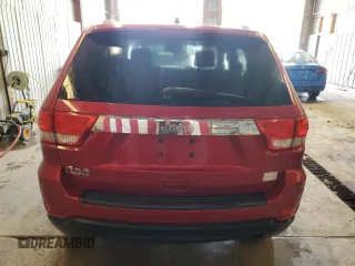 2011 Jeep Grand Cherokee Laredo with VIN 1J4RR4GG3BC669561, listed as a Copart auction lot 63627395 with 99,211 mi miles and Salvage title. Bid and sale history available at DreamBid. Image 6.