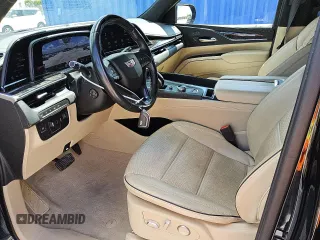 2023 Cadillac Escalade 4WD Premium Luxury z VIN 1GYS4BKL7PR332923, wystawiony jako Copart lot #57442025 z przebiegiem 56 886 mil mil oraz Tytuł czysty. Historia ofert i sprzedaży dostępna na DreamBid. Obrazek 7.