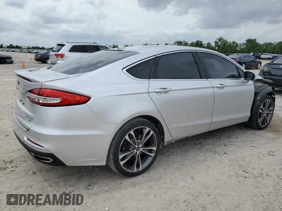 2019 Ford Fusion Titanium with VIN 3FA6P0D99KR105398, listed as a Copart auction lot 54786845 with 122,776 mi miles and Salvage title. Bid and sale history available at DreamBid. Image 3.