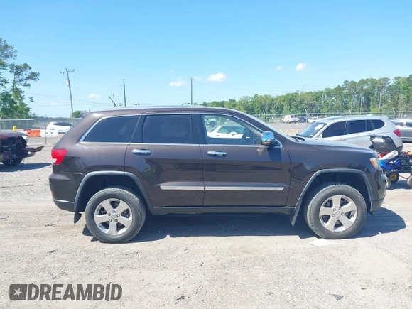 2011 Jeep Grand Cherokee Overland with VIN 1J4RR6GT1BC647292, listed as a IAAI auction lot 42069742 with 199,340 mi miles and . Bid and sale history available at DreamBid. Image 13.