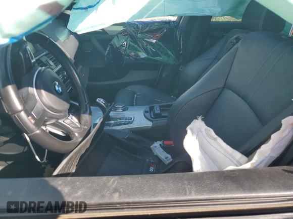 2017 BMW X4 M40i with VIN 5UXXW7C51H0U25511, listed as a Copart auction lot 77492894 with 94,003 mi miles and Salvage Title. Bid and sale history available at carsss.com. Image 7.