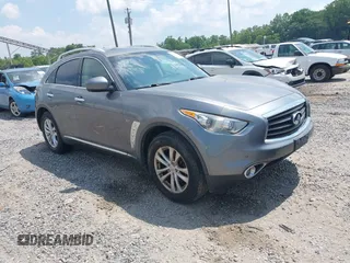 2014 Infiniti QX70 z VIN JN8CS1MW5EM411653, wystawiony jako IAAI lot #42690935 z przebiegiem 110 806 mil mil oraz . Historia ofert i sprzedaży dostępna na DreamBid. Obrazek 1.