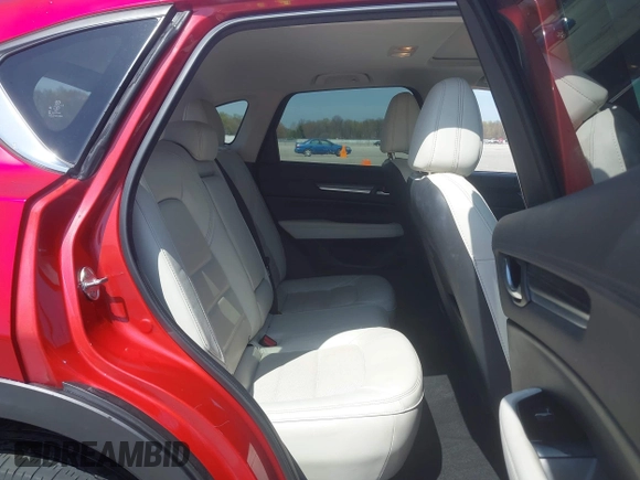 2018 Mazda CX-5 Grand Touring with VIN JM3KFBDM6J0424663, listed as a IAAI auction lot 42003207 with 95,442 mi miles and . Bid and sale history available at DreamBid. Image 8.