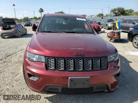 2020 Jeep Grand Cherokee Laredo E with VIN 1C4RJEAG2LC379633, listed as a Copart auction lot 58437555 with 57,219 mi miles and Salvage title. Bid and sale history available at DreamBid. Image 5.
