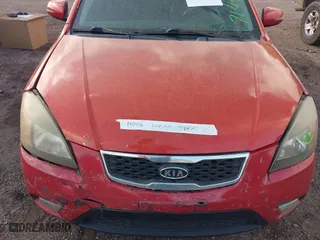2011 Kia Rio LX with VIN KNADH4A33B6714471, listed as a IAAI auction lot 41970737 with 188,214 mi miles. Bid and sale history available at carsss.com. Image 10.