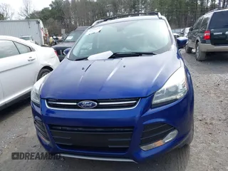 2016 Ford Escape Titanium with VIN 1FMCU9JXXGUA71898, listed as a IAAI auction lot 41758284 with 51,935 mi miles. Bid and sale history available at carsss.com. Image 12.