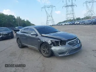 2013 Ford Taurus Limited with VIN 1FAHP2F87DG141383, listed as a IAAI auction lot 40200514 with 158,326 mi miles. Bid and sale history available at carsss.com. Image 1.