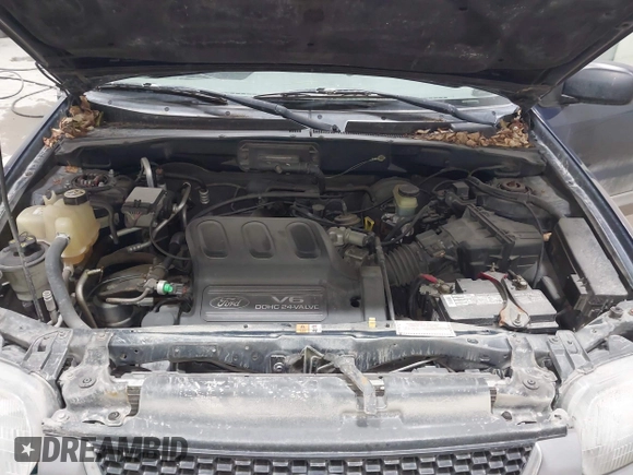 2002 Ford Escape XLT Choice z VIN 1FMCU04162KB99594, wystawiony jako IAAI lot #42632848 z przebiegiem 166 632 mil mil oraz . Historia ofert i sprzedaży dostępna na DreamBid. Obrazek 10.