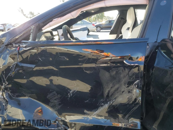 2024 Tesla Model S Plaid с VIN 5YJSA1E61RF539332, выставлен на аукционе Copart как лот 78630904 с пробегом Не указан миль и Списание • Salvage title. История ставок и продаж доступна на DreamBid. Изображение 7.