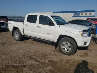 2013 Toyota Tacoma with VIN 3TMLU4EN6DM113113, listed as a Copart auction lot 58121785 with 131,058 mi miles and Salvage title. Bid and sale history available at DreamBid. Image 4.
