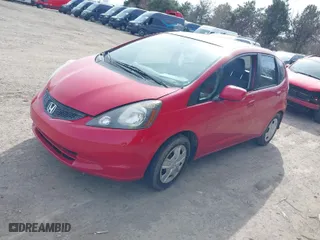 2013 Honda Fit with VIN JHMGE8H3XDC075496, listed as a IAAI auction lot 41863766 with 94,787 mi miles. Bid and sale history available at carsss.com. Image 2.