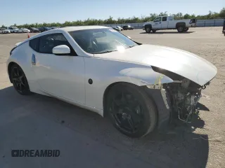 2012 Nissan 370Z с VIN JN1AZ4EH2CM565026, выставлен на аукционе Copart как лот 56129015 с пробегом 113 456 миль миль и Списание • Salvage title. История ставок и продаж доступна на DreamBid. Изображение 4.
