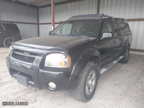 2003 Nissan Frontier 4WD SVE with VIN 1N6MD29Y73C415360, listed as a IAAI auction lot 42093683 with 131,291 mi miles. Bid and sale history available at carsss.com. Image 2.