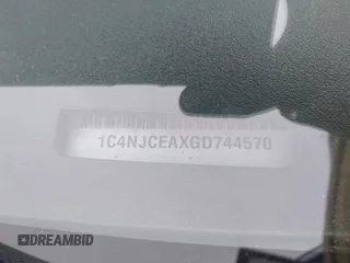 2016 Jeep Compass High Altitude Edition with VIN 1C4NJCEAXGD744570, listed as a IAAI auction lot 41511452 with 118,663 mi miles. Bid and sale history available at carsss.com. Image 9.