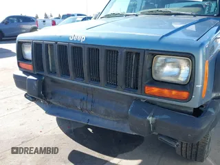 1998 Jeep Cherokee Sport with VIN 1J4FT68S0WL231959, listed as a IAAI auction lot 41680076 with 252,369 mi miles. Bid and sale history available at carsss.com. Image 6.