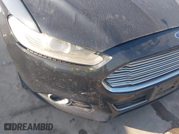 2014 Ford Fusion Titanium with VIN 3FA6P0K94ER115795, listed as a IAAI auction lot 42230295 with 266,277 mi miles and . Bid and sale history available at DreamBid. Image 12.