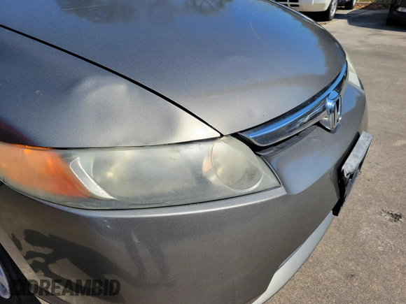 2008 Honda Civic LX z VIN 2HGFA16528H351971, wystawiony jako IAAI lot #41810695 z przebiegiem 221 757 mil mil oraz . Historia ofert i sprzedaży dostępna na DreamBid. Obrazek 6.