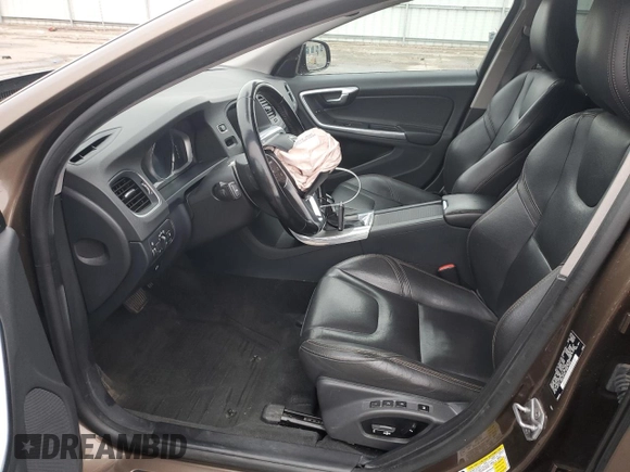 2015 Volvo V60 T5 z VIN YV4612HK7F1000537, wystawiony jako Copart lot #84033744 z przebiegiem 76 563 mil mil oraz Szkoda całkowita • Salvage title. Historia ofert i sprzedaży dostępna na DreamBid. Obrazek 7.
