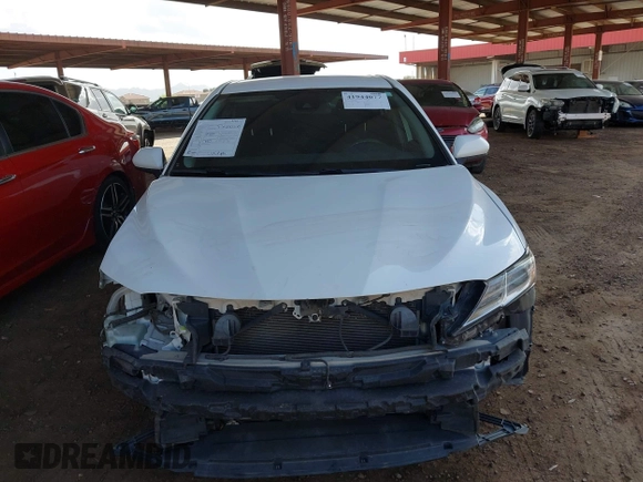 2019 Toyota Camry LE with VIN 4T1B11HK0KU798847, listed as a IAAI auction lot 41944077 with 138,289 mi miles and . Bid and sale history available at DreamBid. Image 11.
