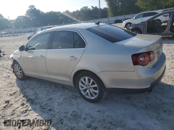 2010 Volkswagen Jetta SE with VIN 3VWRX7AJ1AM048637, listed as a Copart auction lot 57045965 with 158,297 mi miles and Salvage title. Bid and sale history available at DreamBid. Image 2.