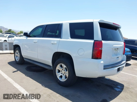 2015 Chevrolet Tahoe Commercial with VIN 1GNSK3EC9FR622941, listed as a IAAI auction lot 42592315 with 239,334 mi miles and . Bid and sale history available at DreamBid. Image 3.