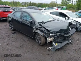 2017 Toyota Corolla L z VIN 2T1BURHE7HC818988, wystawiony jako IAAI lot #42287441 z przebiegiem 197 475 mil mil oraz . Historia ofert i sprzedaży dostępna na DreamBid. Obrazek 1.
