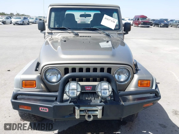 2003 Jeep Wrangler X with VIN 1J4FA39S03P312550, listed as a IAAI auction lot 41837150 with 127,239 mi miles and . Bid and sale history available at DreamBid. Image 12.
