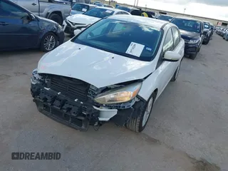 2017 Ford Focus SE with VIN 1FADP3F28HL285649, listed as a IAAI auction lot 39718289 with 118,366 mi miles and . Bid and sale history available at DreamBid. Image 2.