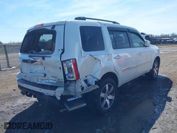 2013 Honda Pilot Touring with VIN 5FNYF3H9XDB006353, listed as a IAAI auction lot 41826557 with 174,552 mi miles and . Bid and sale history available at DreamBid. Image 4.