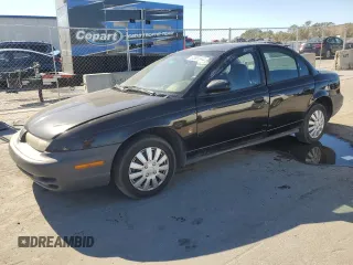 1997 Saturn SL with VIN 1G8ZH5285VZ238858, listed as a Copart auction lot 82961344 with 166,226 mi miles and Salvage Title. Bid and sale history available at carsss.com. Image 1.