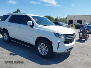 2023 Chevrolet Tahoe LT z VIN 1GNSCNKD2PR295967, wystawiony jako IAAI lot #41859502 z przebiegiem 47 476 mil mil oraz . Historia ofert i sprzedaży dostępna na DreamBid. Obrazek 1.