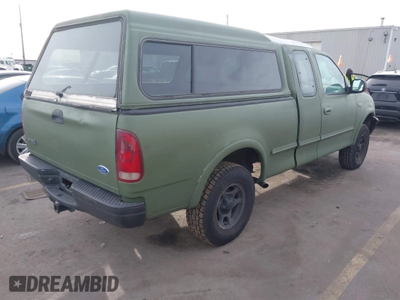 1997 Ford F-150 XL with VIN 1FTDX1861VKA60604, listed as a IAAI auction lot 41060909 with 269,715 mi miles. Bid and sale history available at carsss.com. Image 4.