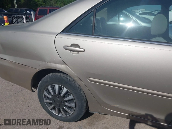 2006 Toyota Camry STD with VIN 4T1BE32KX6U148521, listed as a IAAI auction lot 42014266 with 148,694 mi miles. Bid and sale history available at carsss.com. Image 6.