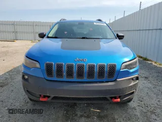 2019 Jeep Cherokee Trailhawk with VIN 1C4PJMBX7KD277477, listed as a Copart auction lot 58969705 with 139,521 mi miles and Salvage title. Bid and sale history available at DreamBid. Image 5.