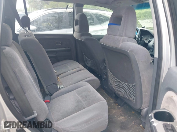 2005 Honda Pilot LX z VIN 2HKYF18185H572190, wystawiony jako IAAI lot #42135127 z przebiegiem 201 768 mil mil oraz . Historia ofert i sprzedaży dostępna na DreamBid. Obrazek 8.