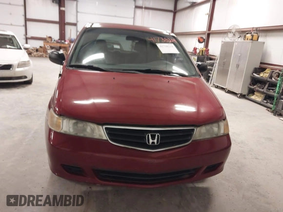 2002 Honda Odyssey LX z VIN 5FNRL18552B019426, wystawiony jako IAAI lot #41738214 z przebiegiem 202 577 mil mil oraz . Historia ofert i sprzedaży dostępna na DreamBid. Obrazek 6.
