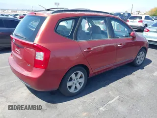 2008 Kia Rondo EX with VIN KNAFG525387174835, listed as a IAAI auction lot 42011406 with 138,656 mi miles. Bid and sale history available at carsss.com. Image 4.