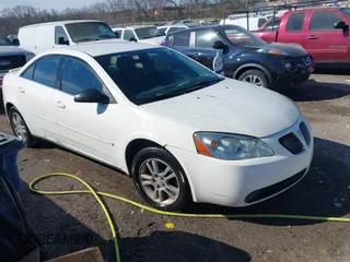 2006 Pontiac G6 6-Cyl z VIN 1G2ZG558064227127, wystawiony jako IAAI lot #41662905 z przebiegiem 268 266 mil mil oraz . Historia ofert i sprzedaży dostępna na DreamBid. Obrazek 1.