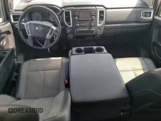 2017 Nissan Titan S with VIN 1N6AA1EJ2HN554628, listed as a Copart auction lot 60963515 with 137,574 mi miles and Salvage title. Bid and sale history available at DreamBid. Image 8.