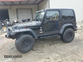 2004 Jeep Wrangler Sahara with VIN 1J4FA59SX4P722608, listed as a Copart auction lot 51223345 with 146,600 mi miles and Salvage title. Bid and sale history available at DreamBid. Image 1.