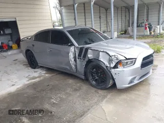 2013 Dodge Charger RT with VIN 2C3CDXCTODH597804, listed as a IAAI auction lot 41654850 with 130,308 mi miles. Bid and sale history available at carsss.com. Image 1.